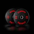 Par de discos bumper CATFIT 20 kg, 50 mm, alta resistencia. Ideal para barras olímpicas y entrenamientos de fuerza en casa o box.